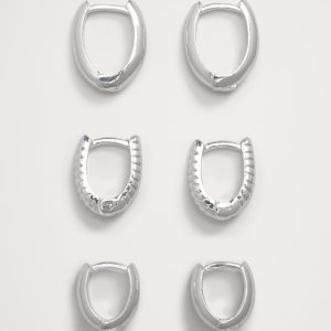 Ravena Oval Huggie Hoop Earrings Set Of 3 by Aureus + Argent